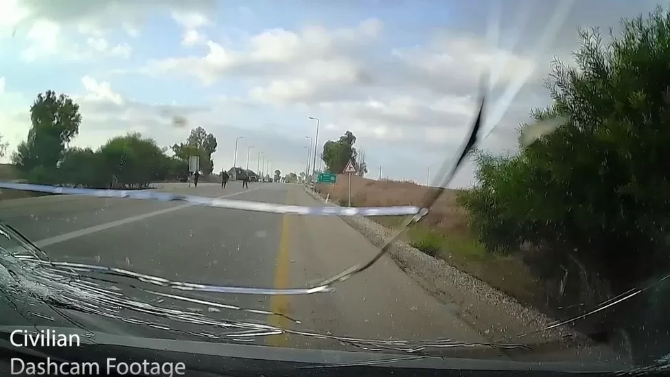 Dashcam footage showed the moment Hamas gunmen fired at a civilian car, cracking the windscreen