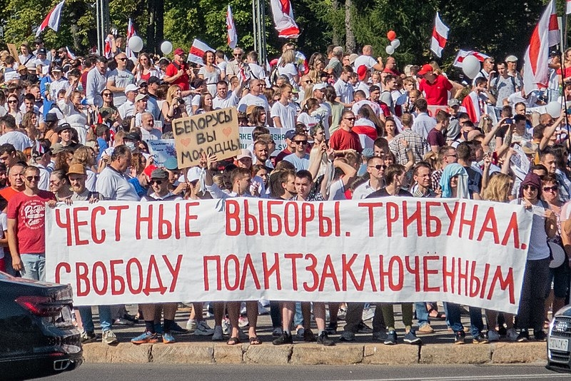 Protesters holding banner that reads: 'Fair elections. Tribunal. Freedom to the political prisoners' at a rally against Lukashenko on Aug. 16, 2020, in Minsk.