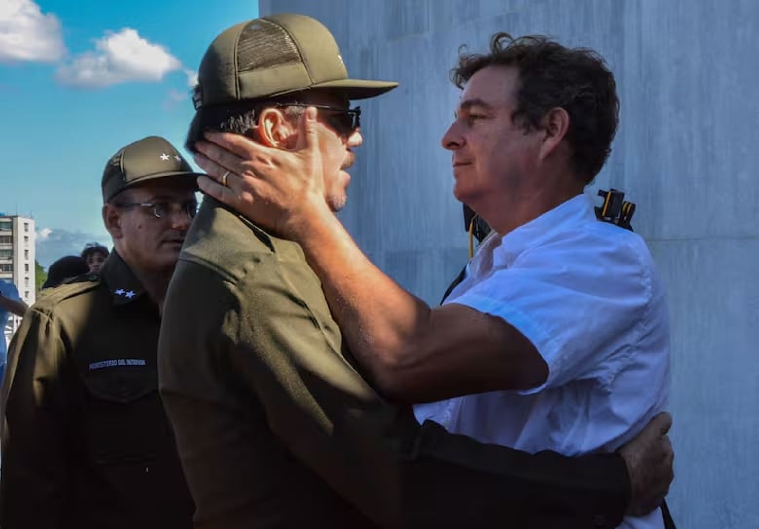 Alejandro Castro Espín, Raúl Castro’s son, offers condolences after Fidel’s death to his cousin Antonio Castro Soto del Valle, Fidel Castro’s son, at the Plaza de la Revolución in Havana on November 28, 2016.
