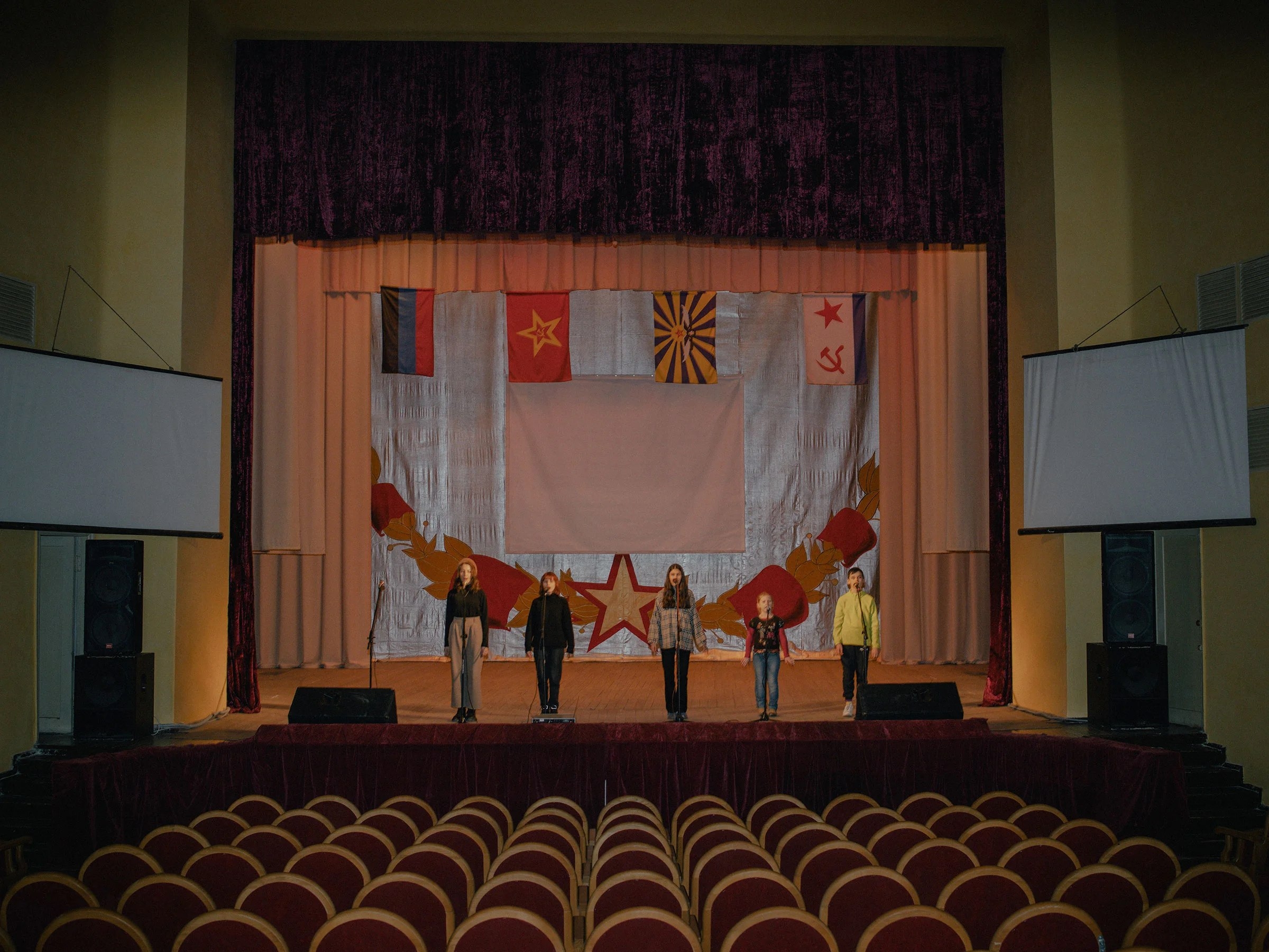 School children at a concert rehearsal at the house of culture in Petrovskyi District, Donetsk, Ukraine, where the 2014 frontline is only a few miles away, on Feb. 17.