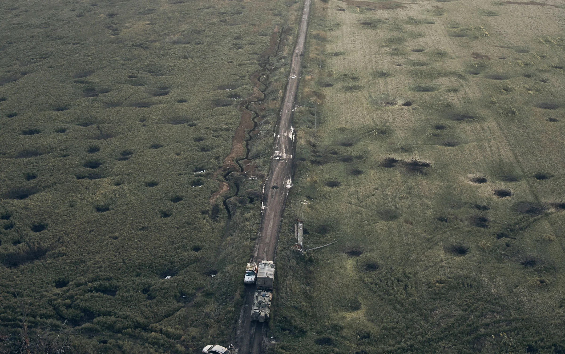 A field covered with craters left by shelling, close to Izium, Kharkiv region, Ukraine, on Sept. 13. 