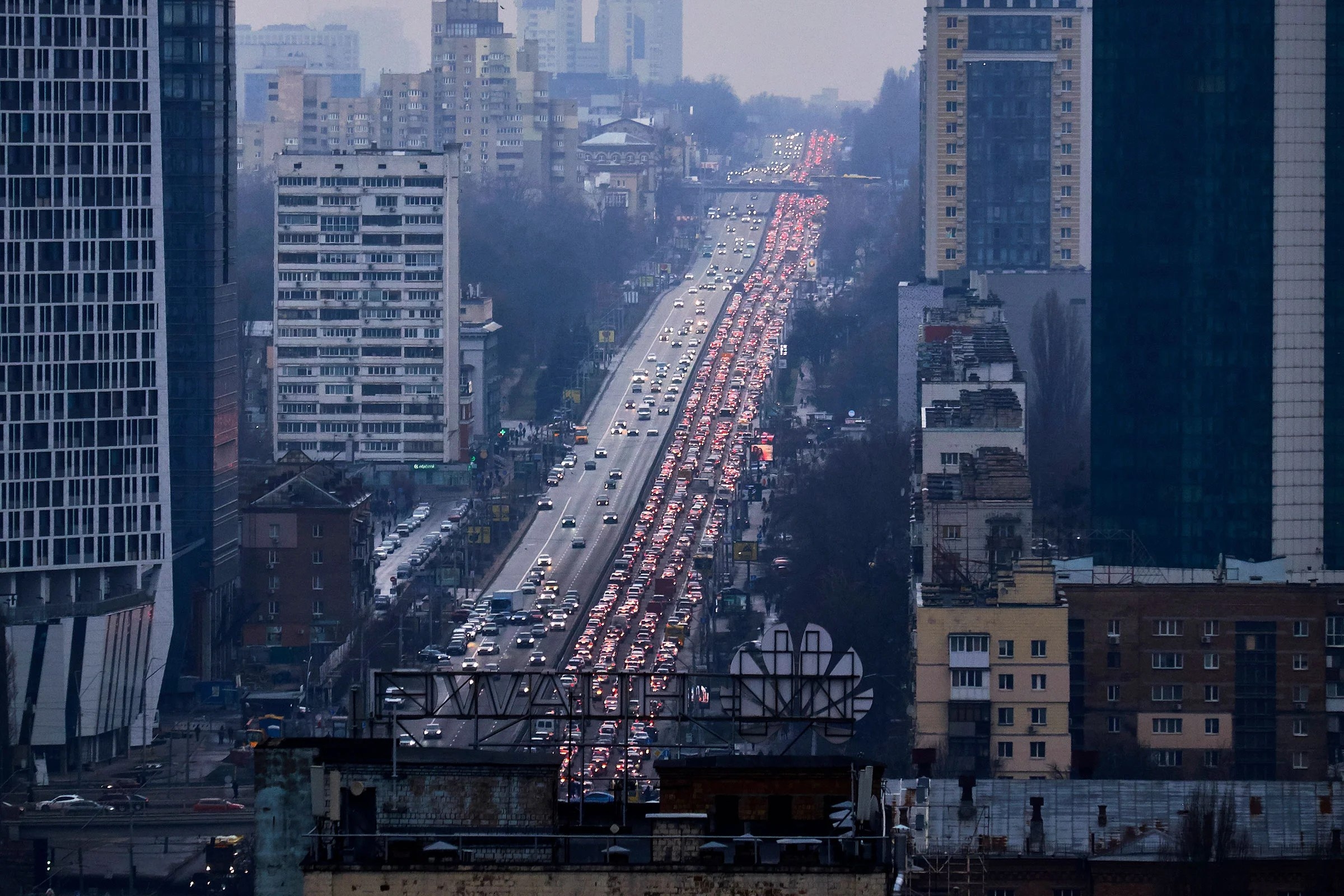 Inhabitants of Kyiv leave the city following pre-offensive missile strikes of the Russian armed forces and Belarus in Kyiv, Ukraine on Feb. 24. 
