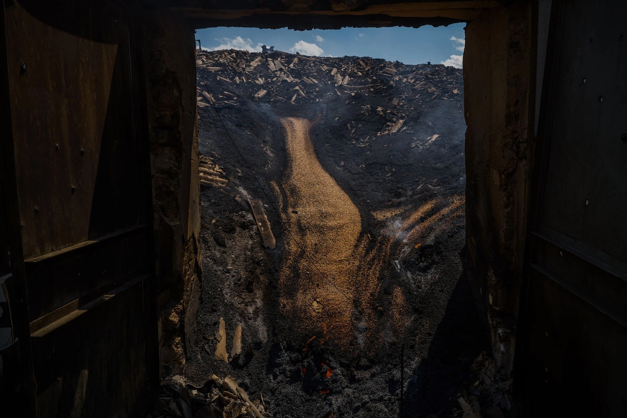 A bombed grain silo containing still burning grain inside in Zasillya, Ukraine, on July 16. 