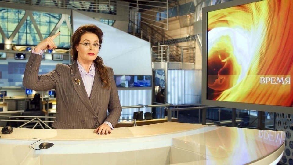 Ekaterina Andreeva, host of Channel One's Vremya, poses in Soviet-era clothing as part of the program's 50-year anniversary in 2017. Photo: Pervy Kanal (Channel One)