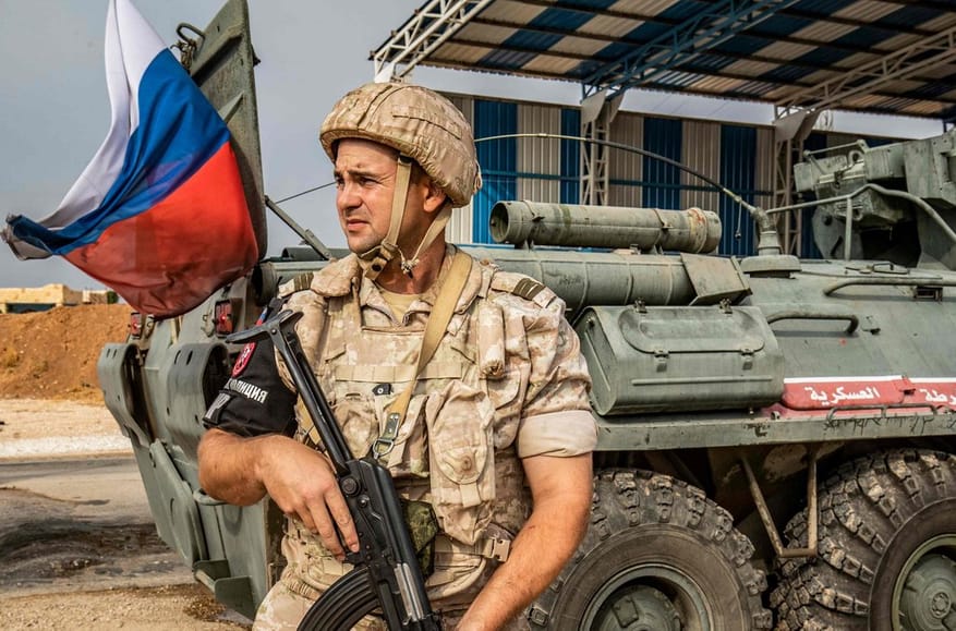 War crimes, a symphony orchestra, and one smoking aircraft carrier: A look back at nine years of Russian intervention in Syria