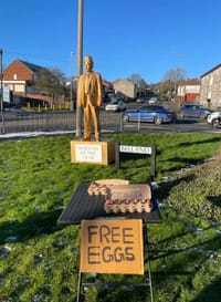 Members of the public were offered the opportunity to throw eggs at the statue