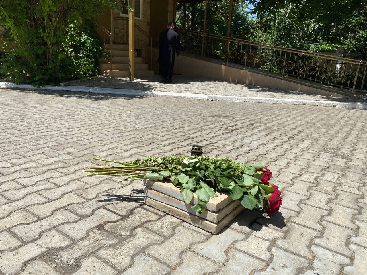 Flowers have been brought to the cathedral entrance in memory of the security guard who was shot dead by the terrorists