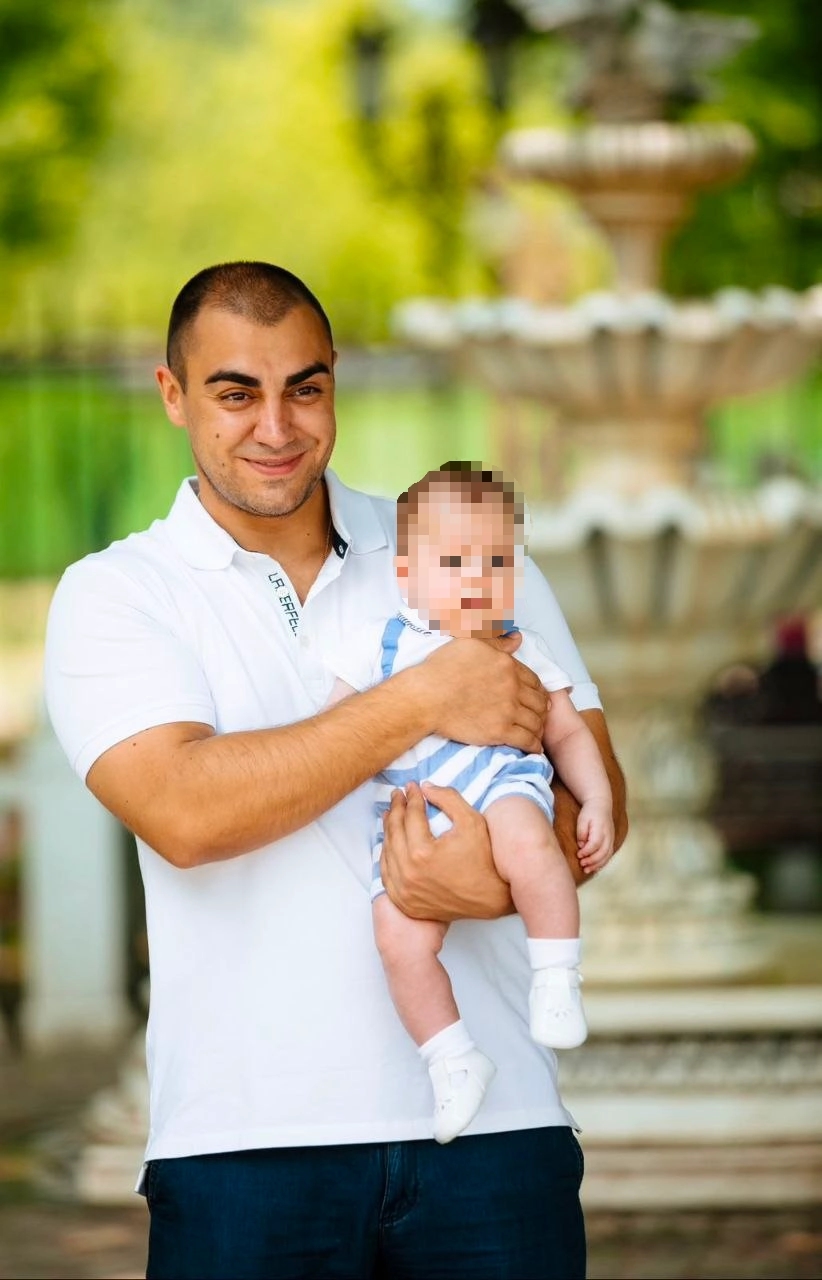 Georgy Azatyan with his child