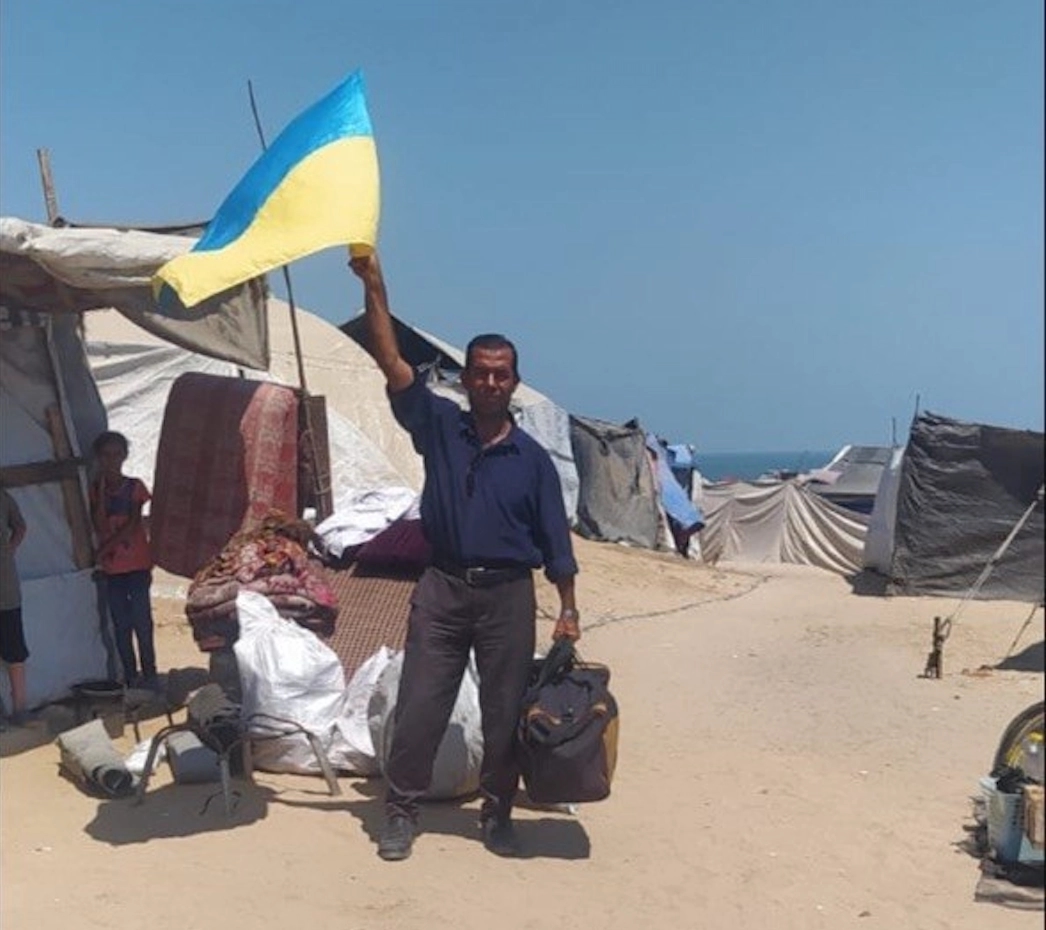 Nidal Abu Auda with a Ukrainian flag