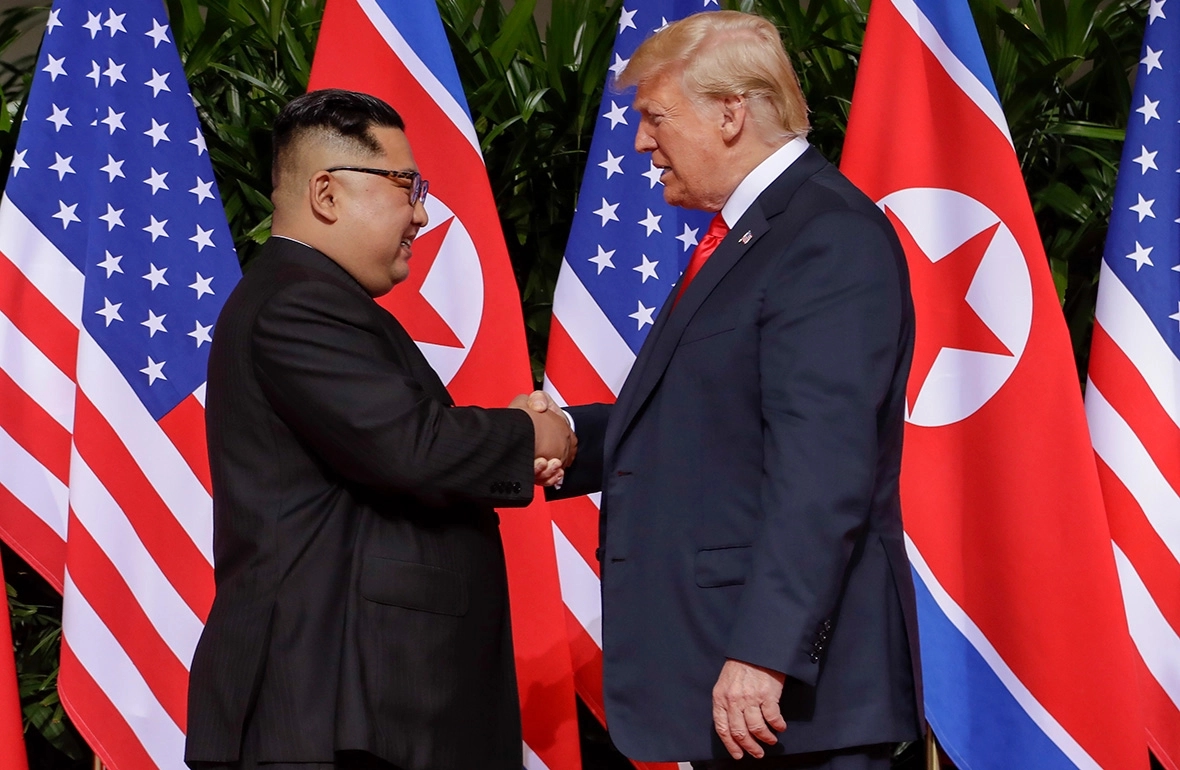Kim Jong Un and Donald Trump during their first meeting in 2018