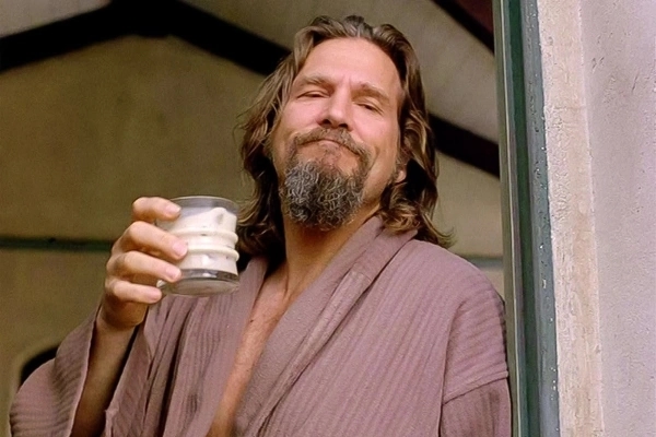 A still from The Big Lebowski. The character with a White Russian cocktail