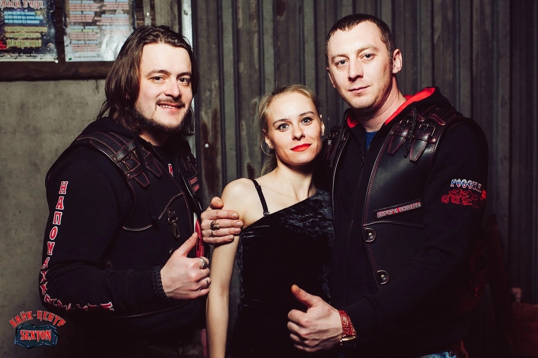 Denis Nalyotov, right, wearing a vest with the insignia of the Night Wolves’ “Roads of Victory” division