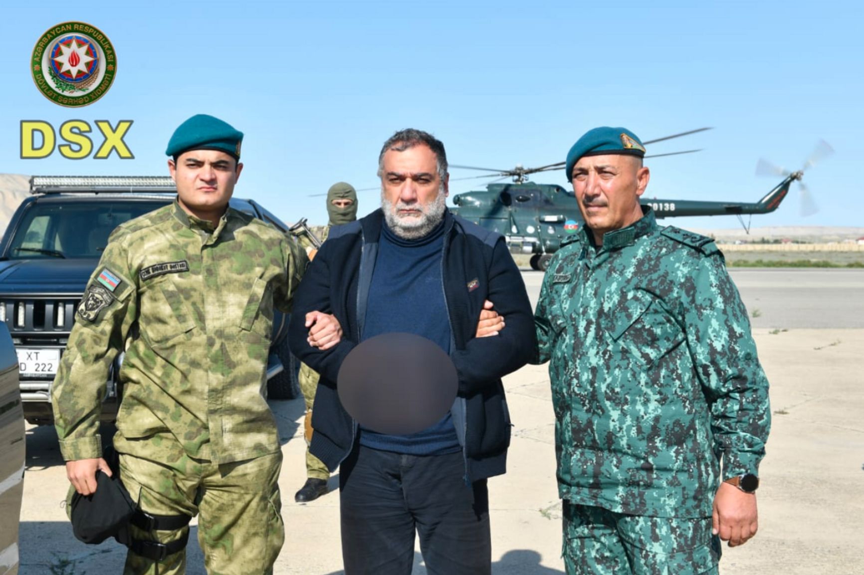 Karabah ex-state minister Ruben Vardanyan in handcuffs after being detained by Azerbaijan's State Border Service