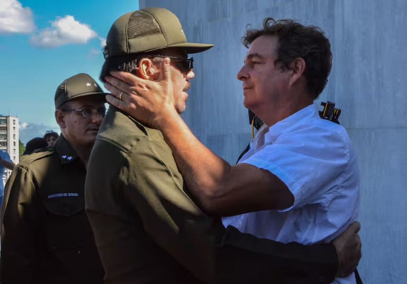 Alejandro Castro Espín, Raúl Castro’s son, offers condolences after Fidel’s death to his cousin Antonio Castro Soto del Valle, Fidel Castro’s son, at the Plaza de la Revolución in Havana on November 28, 2016.