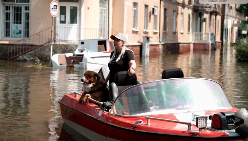 Olena on a boat during the flood in Kherson