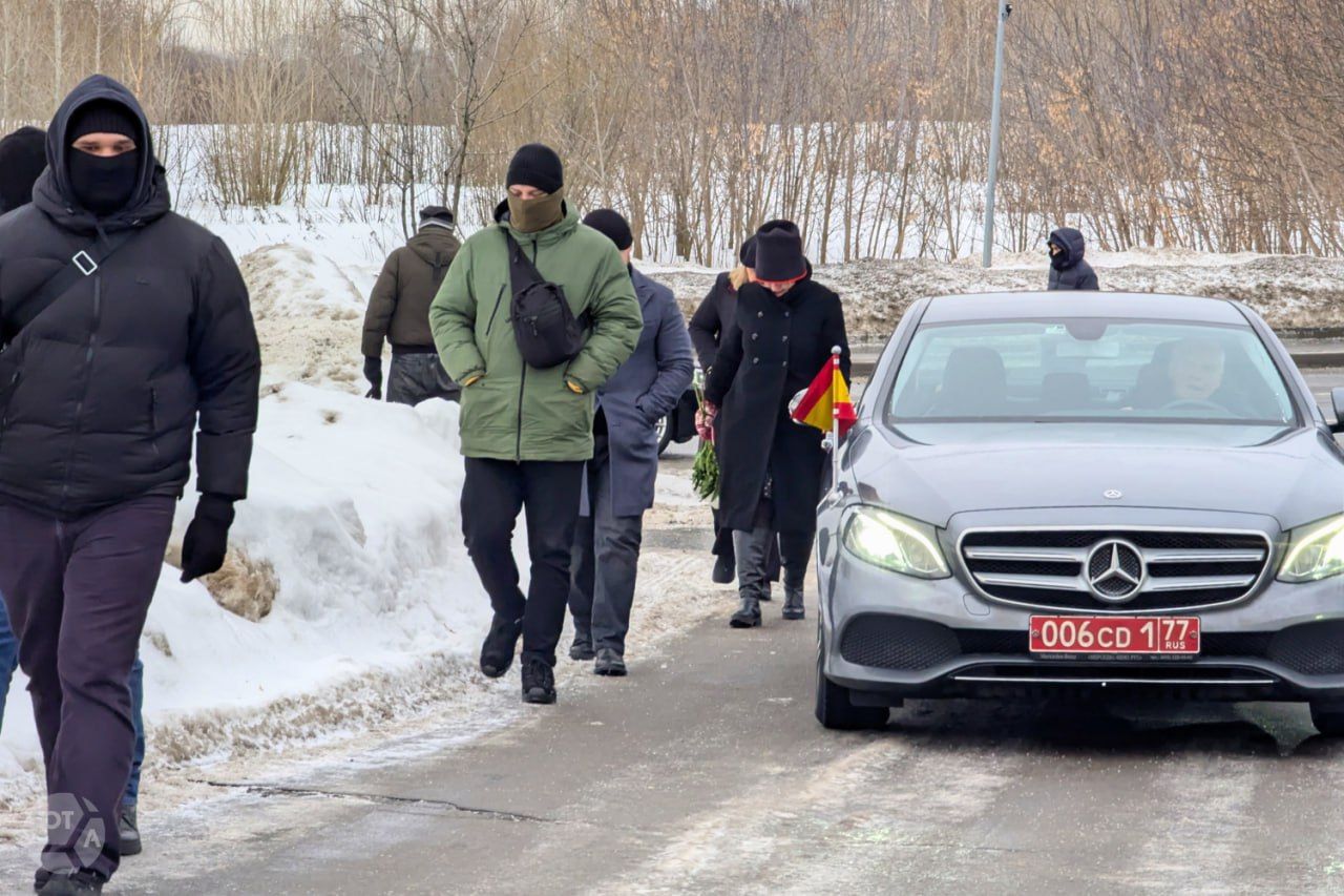A vehicle from the Spanish Embassy in Moscow pulls up to Borisovskoye Cemetery, where Navalny is buried. 