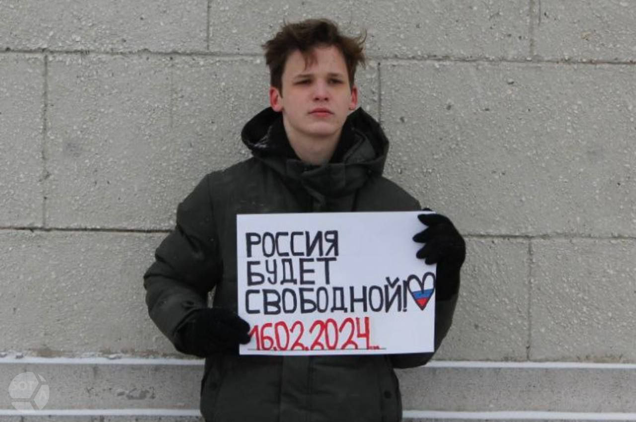 One of the picketers detained in Moscow. Photo: SotaVision